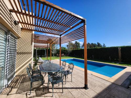 San Nicolas de los Arroyos House | Pet-Friendly Casa en Club de Campo with Pool & Ocean View