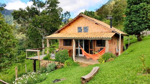 Sao Bento do Sapucai Ski Chalet | Enchanting Mountain Retreat: Pet & Child Friendly Escape