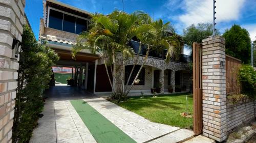 Capivari House | Spacious Casa with Game Room and Ocean Views Await You