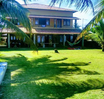 Guaibim House | Experience Casa Flamboaiã: Oceanfront Retreat with Breakfast
