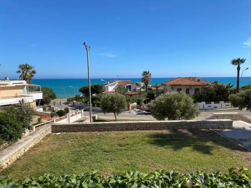 Marina di Ragusa Apartment | Discover Casa Fortuna: Ocean Views & Private Beach Access