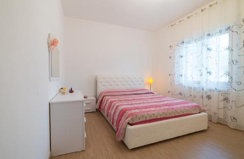 Santa Teresa di Riva Apartment | Discover Casa Grazia: Family-Friendly Retreat with 9.2 Rating