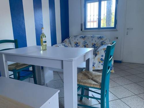 Villaggi House | Idyllic Casa in Riva al Lago with Private Beach & Ocean View