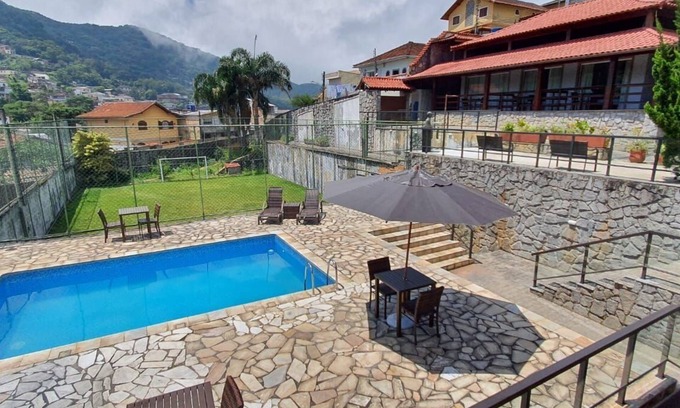 Petropolis Cottage | Relax at Casa Indaiá: Ocean Views and Pet-Friendly Stays