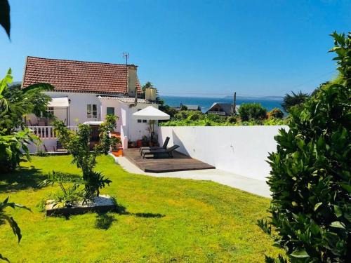 Bueu House | Beachside Retreat with Garden and Ocean Views
