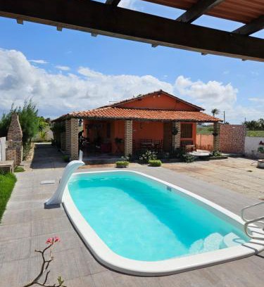 Coqueiro House | Relaxing Retreat: Casa Ampla with Pool in Luis Correia