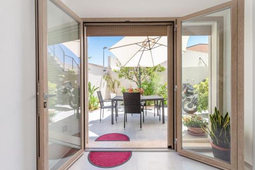 Cabras House | Pet-Friendly CASA L'ANGOLO FIORITO with Oceanfront Views