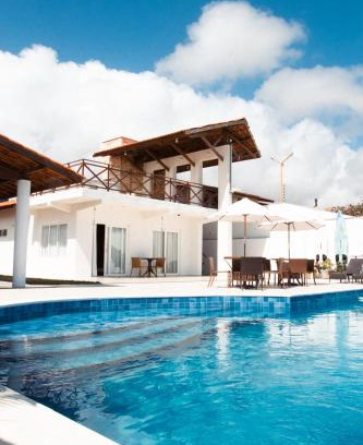 Jacauna House | Casa La Baule: Oceanfront Retreat with Hot Tub & Pool