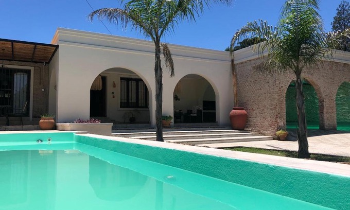 Villa Carlos Paz House | Casa LOS ARCOS: Guest Rated 10/10 with Pool & Pet-Friendly