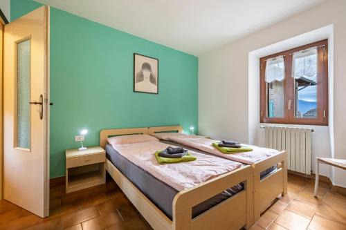 Vesio Apartment | Discover Casa Luisa: Family-Friendly Retreat by Lake Garda