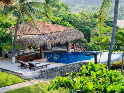 Troncones Bed & Breakfast | Oceanfront Point Room at Casa Manzanillo - Rated 9/10