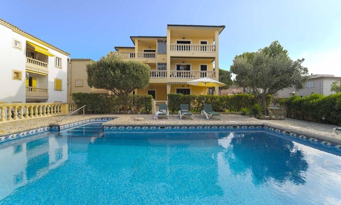 Can Picafort Apartment | Unwind at Casa-Maryani: Poolside Relaxation in Majorca