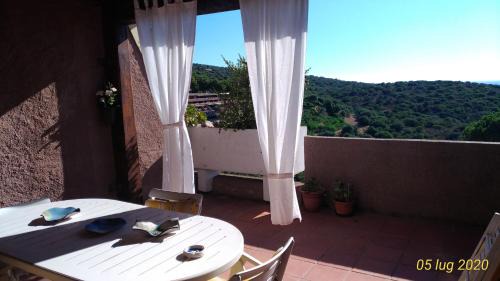 Cugnana Verde Apartment | Elegant Casa Massimo with Ocean Views in Costa Smeralda