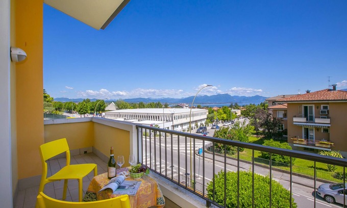 Rivoltella Apartment | Discover Casa Michelangelo: Lake View & Family-Friendly Stay