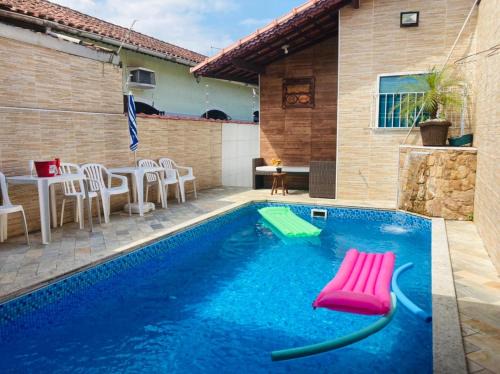 Real Villa | Modern Beachside Retreat with Pool & Gourmet BBQ Area