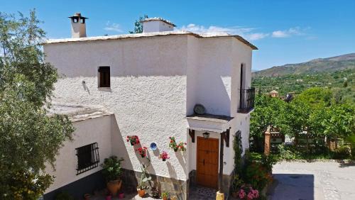Nechite House | Cozy Holiday Home for 8 in Válor, Andalusia with Pool