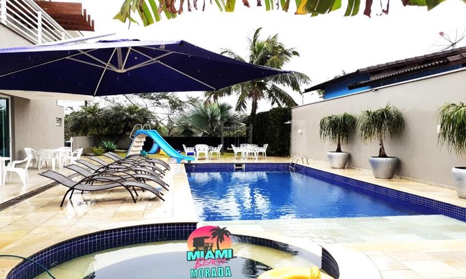Balneario Mogiano House | Experience Casa na Praia: 6-Bedroom Retreat in Bertioaga