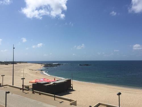 A Ver-o-Mar Apartment | Beachfront Casa na Praia: Family-Friendly with Ocean Views