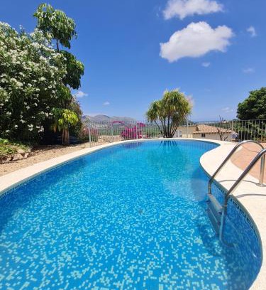 Orba Villa | Discover Casa Nirvana: Family-Friendly with Pool Access