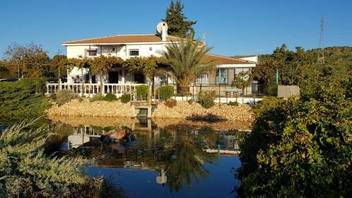 Illora Bed & Breakfast | Experience Casa Olivar B&B: Oceanfront Oasis with Pool