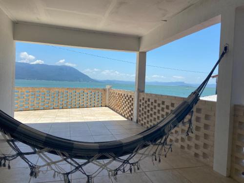 Florianopolis Villa | Oceanfront Bliss at Casa Pé na Areia, Rated 10/10