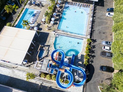 Caldas Novas Hotel | Inviting Casa DiRoma Fiori for Up to 10 Guests in Caldas Novas