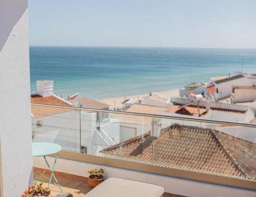 Salema Apartment | Oceanview Retreat: Casa Pedro in Salema, Pet & Child Friendly