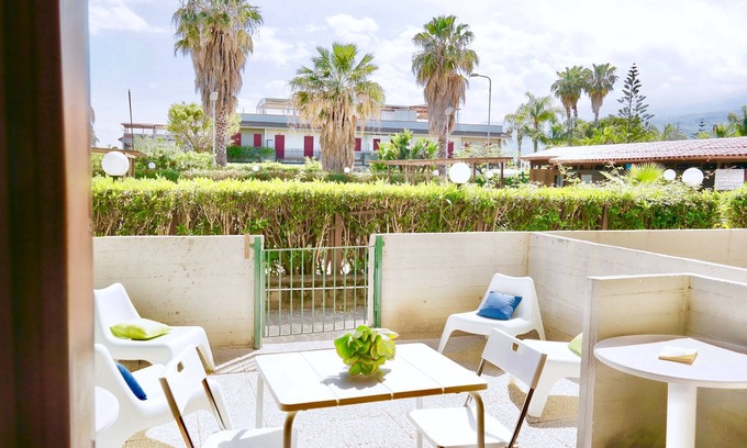 Fondachello Apartment | Relax at Casa Perla: Oceanfront Views & Spa Retreat
