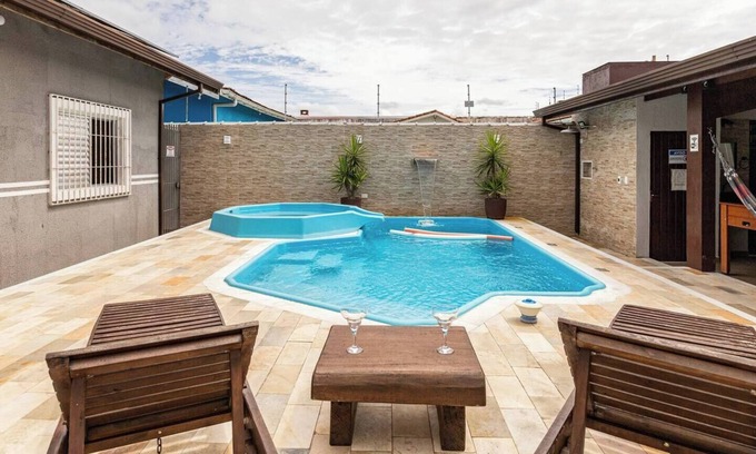 Peruibe House | Enteira Beach House: Poolside Retreat with Ocean Views