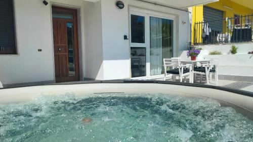 Calatafimi Apartment | Discover Casa Phimes: Pet-Friendly with Hot Tub Amenities