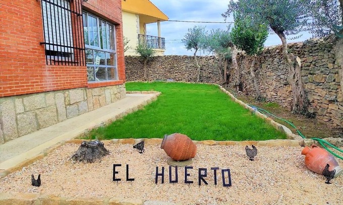 Lumbrales House | Relax at Casa Rural El Huerto with Garden & Family Amenities