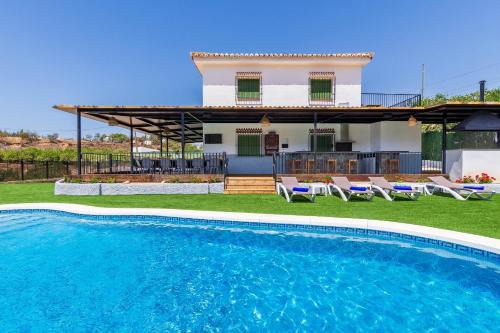 Pizarra House | Discover Casa Rural El Puente: Family-Friendly Retreat