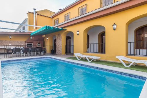 Illora House | Experience Casa Rural La Loma: Oceanfront Retreat with Pool