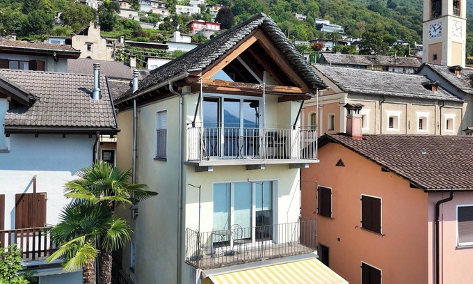 Brione sopra Minusio Apartment | Casa Santa Barbara: Stylish Swiss Holiday Home with Lake and Mountain Views