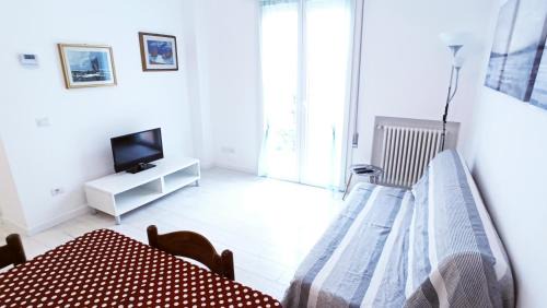 Torre Pedrera Apartment | Beachside Bliss at Casa Sciroc - Pet & Child Friendly Stay