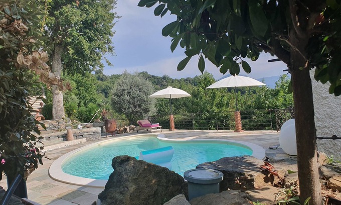 Scolca House | Relax at Casa Serena: Poolside Retreat for Families & Pets