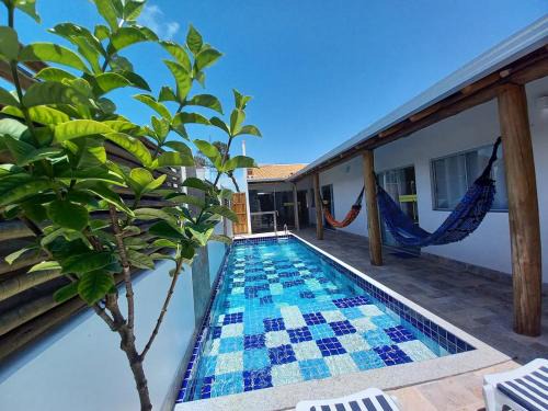 Prado House | Relax at Casa Sol: Oceanfront Pool and Family-Friendly Stay