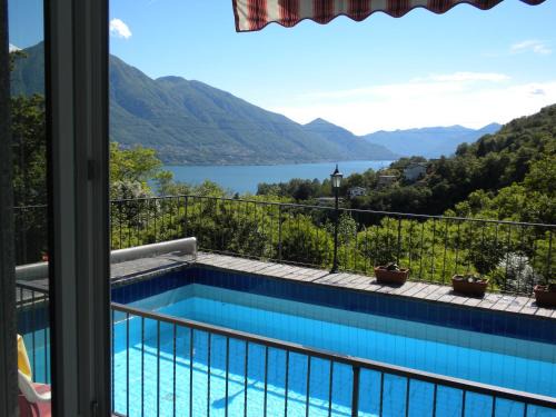 Gordola Apartment | Casa Solaria: Exceptional 4-Star Stay with Pool Access