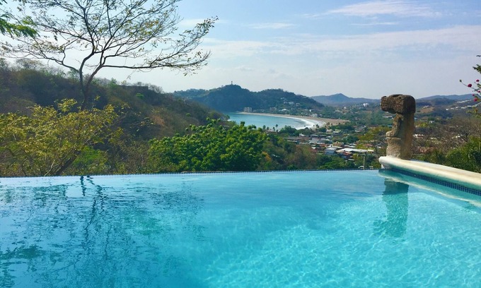 Paradise Bay House | Beachfront Oasis: Ocean View Home with Infinity Pool