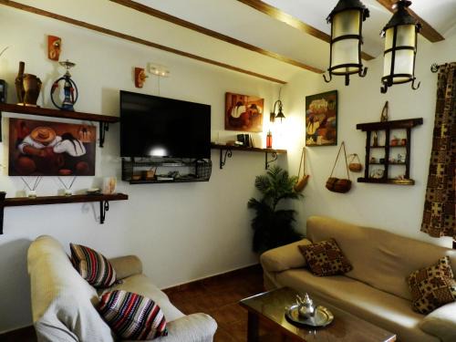Cuevas del Campo House | Discover Comfort at Casa Triana with Pool & Family-Friendly Amenities