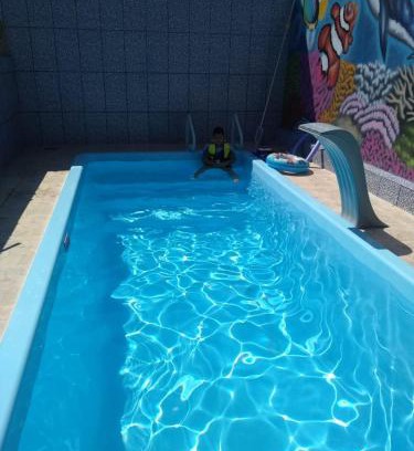 Pedreira House | Relax at Casa Ubatuba: Poolside Comfort & Guest Rated 9.5