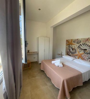 Sant'Isidoro House | Beachfront Escape at Casa Vacanza Marijò with Ocean Views