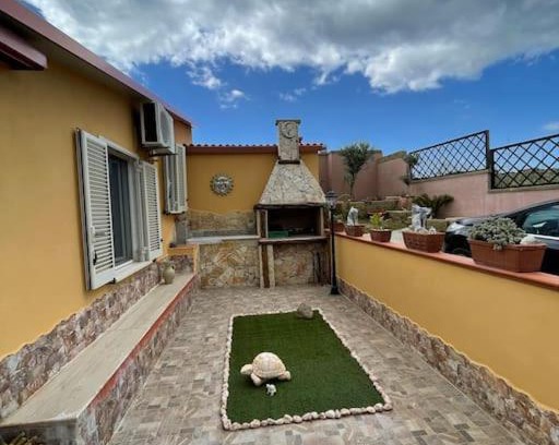 Carbonia House | Elegant Retreat: Casa Vacanze 10 km from the Beach