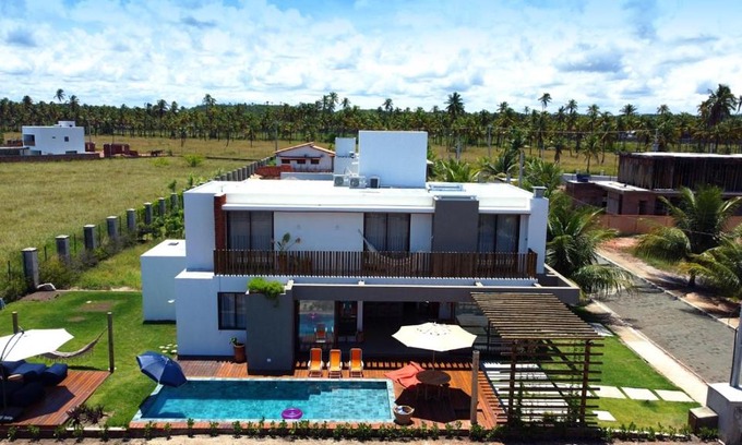 Porto de Pedras House | Idyllic Casa Vilemar do Patacho: Oceanfront Escape with Pool
