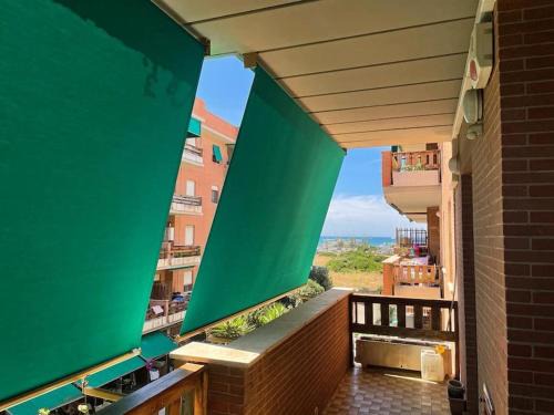 Quartiere XXXV Lido di Castel Fusano Apartment | Casa Vivaldi: Oceanfront Retreat Near Beach and Pine Forest