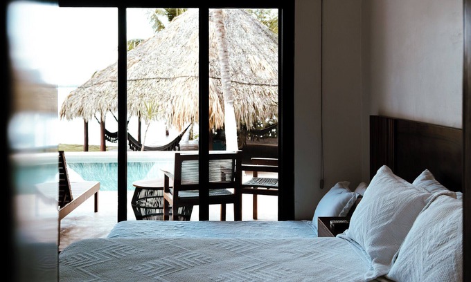 Othon P. Blanco Villa | Casa Xchel in front of the bay, pool, jacuzzi and deck.