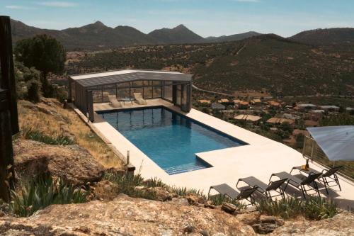 Robledo de Chavela Ski Chalet | Oceanfront Bliss at Casa Zúrich - Guest Rated 9.4/10