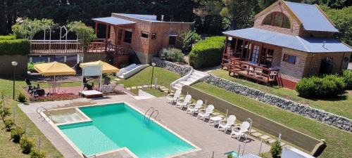Tandil Cabin | Discover CasaAlpina: Oceanfront Oasis with Hot Tub & Pool