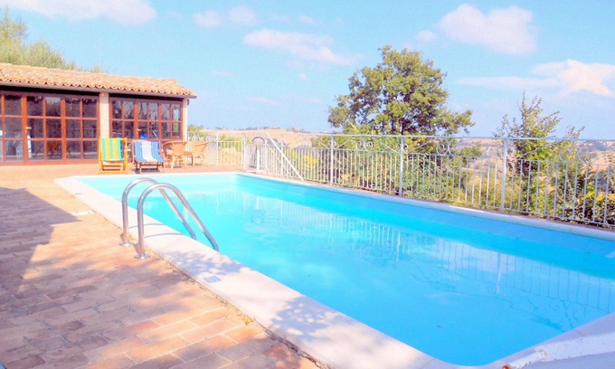 Castel Colonna Bed & Breakfast | Relax at Casale Civetta: Poolside Bliss with Ocean Views
