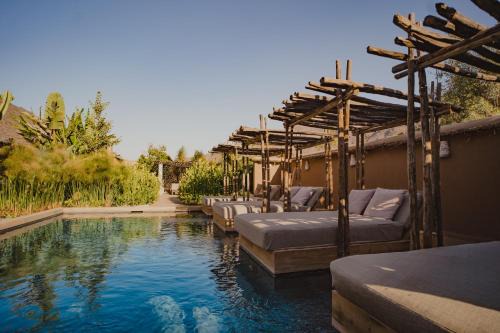El Molle Hotel | Unwind at CasaMolle: Pool, Hot Tub & Child-Friendly Fun